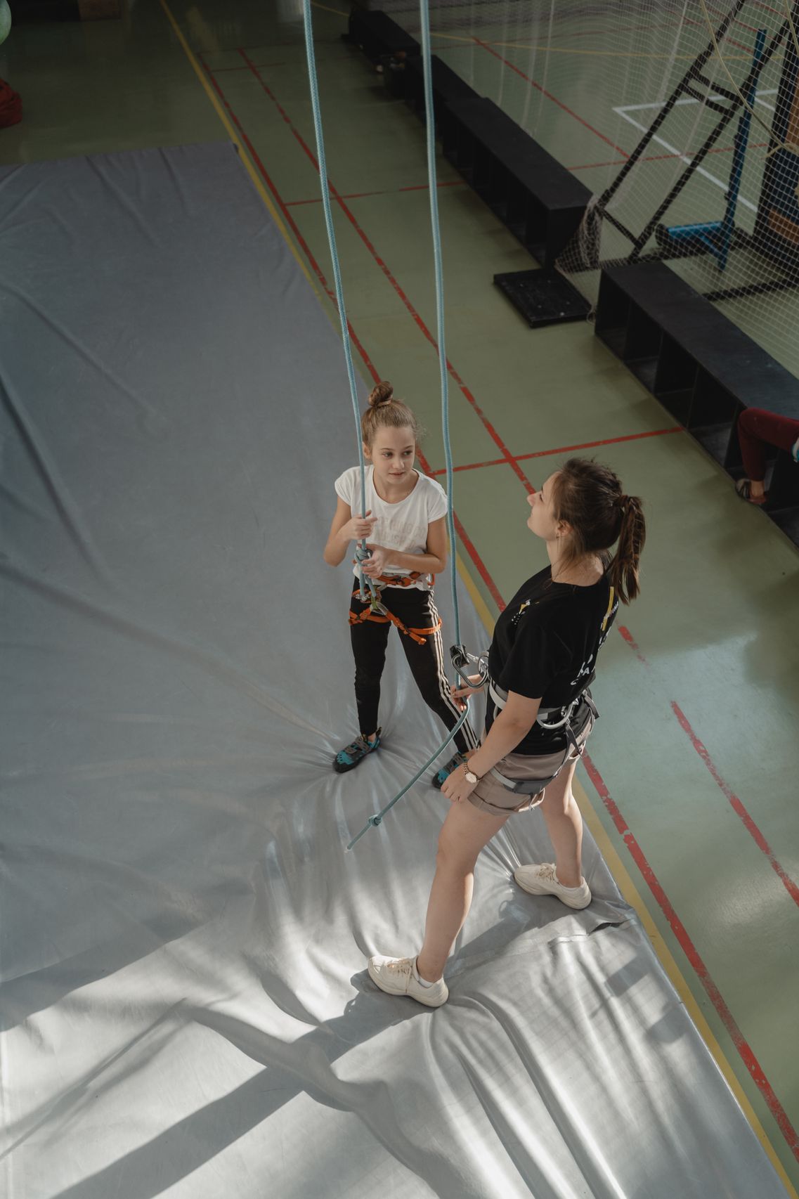 Beginner climbing clinic instructor teaching technique